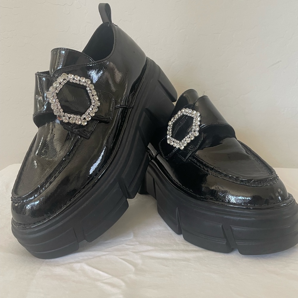 Steve Madden Regal black patten leather jeweled lug sole loafers. Like New